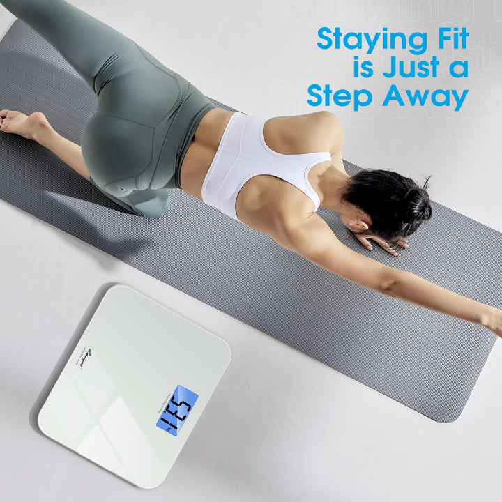 White voice‑enabled digital bathroom scale placed beside yoga mat for daily fitness and body‑weight tracking at home